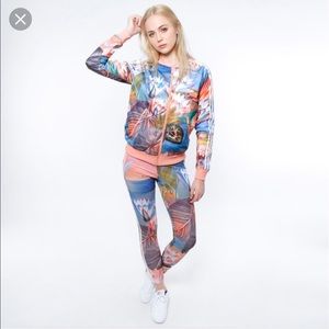 Adidas Curso 3 stripe track suit.